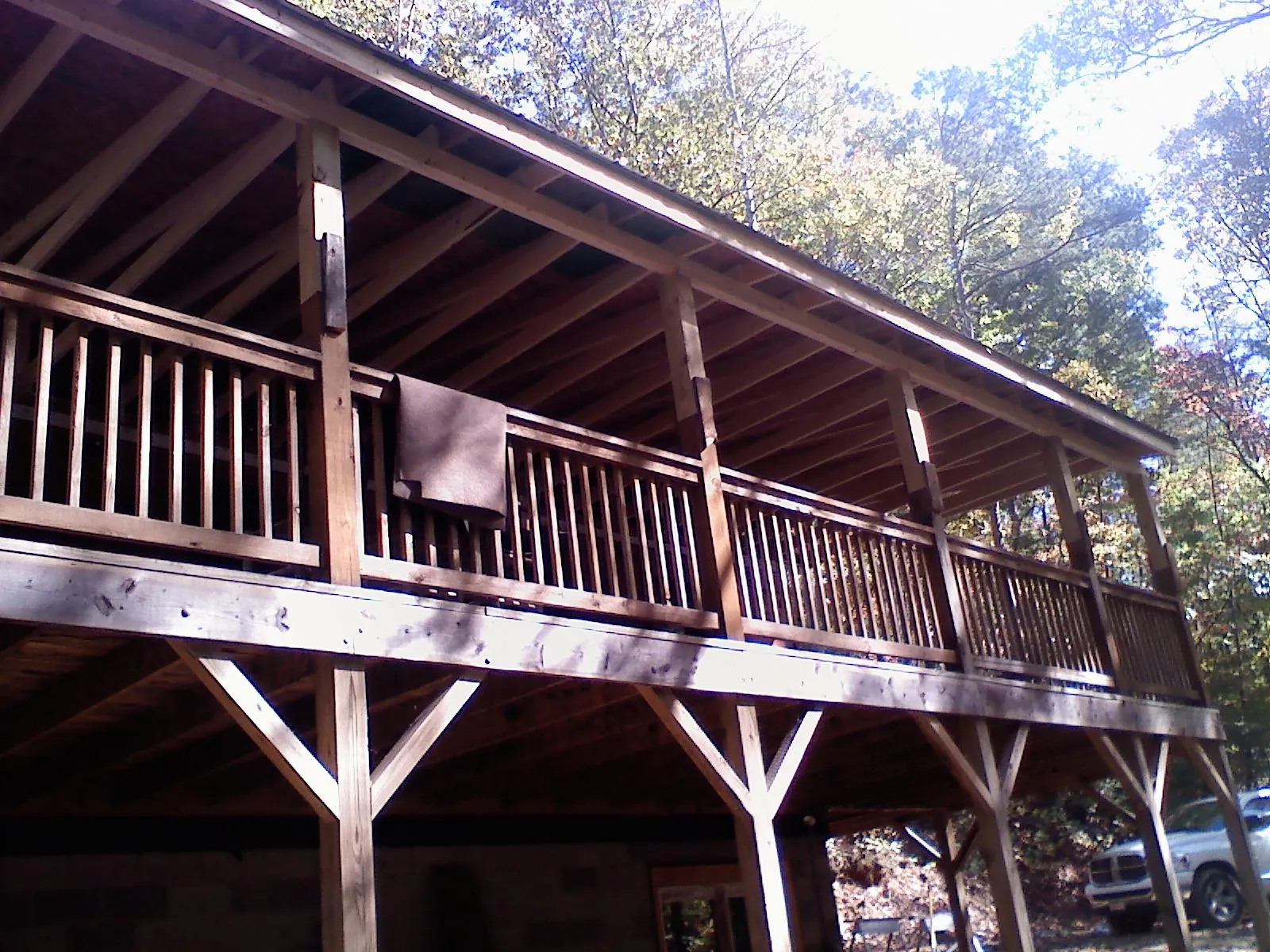 Timber framing under a new elevated porch and deck — Roof Leak Repair in Palm Springs by Roofing Brothers